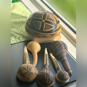 Handcrafted African calabash gourds including bowls and ladles